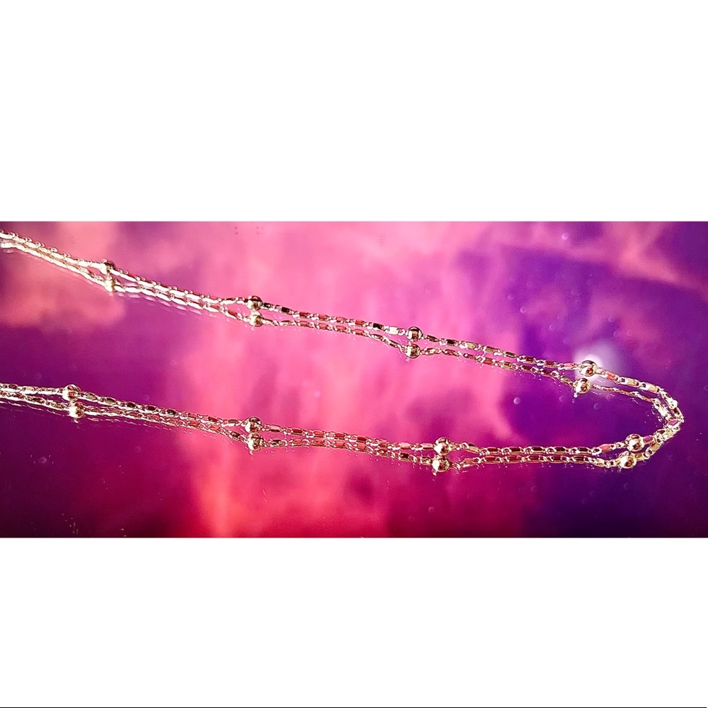 Gold color beaded chain necklace